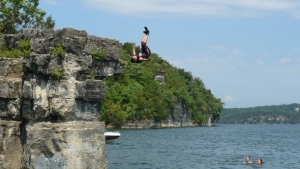 Boy jumps off bluff at Norfork lake