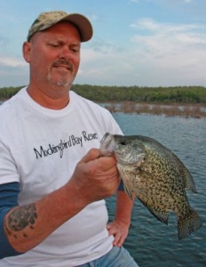 Man hold crappie fish Norfork Lake