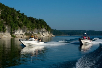 Boats near bluffs on lake