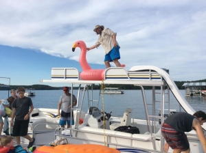 Loading up a pontoon boat for a day of boating