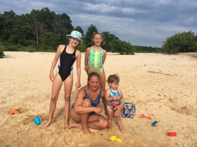 Family on Sandy beach Norfork Lake