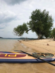 Paddle board beached at Sand Island