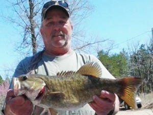 Man with nice Bass fish