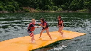 Kids playing on water mat