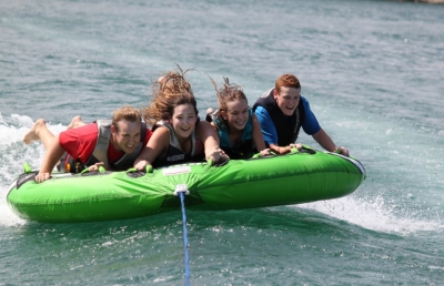 Teens tubing on Norfork Lake