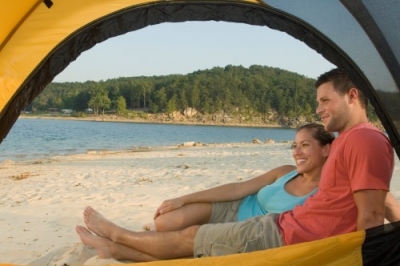 Couple Camping on Sandy beach on Norfork Lake